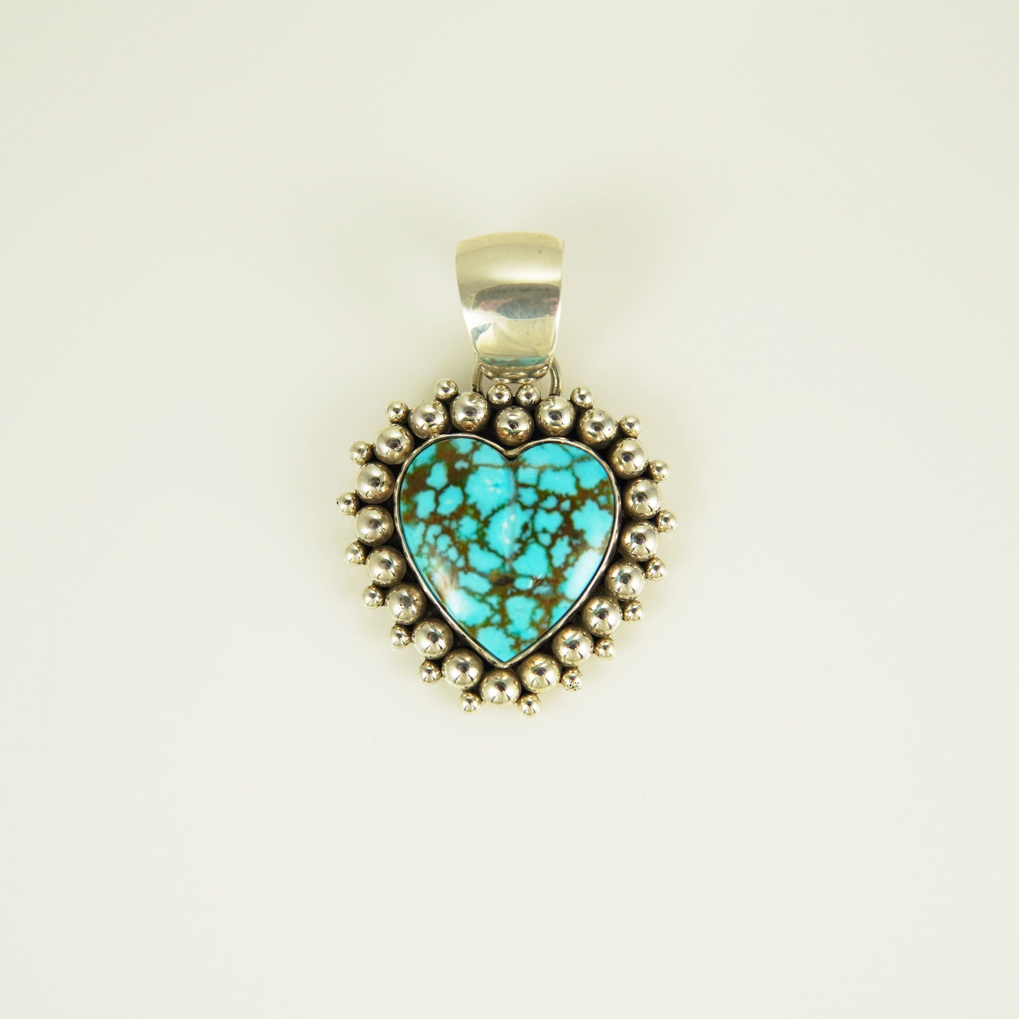 Sterling Silver and Kingman Turquoise Pendant by Artie Yellowhorse